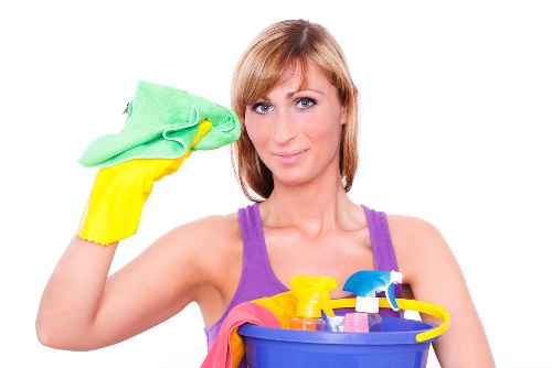 Cleaner following safe working practices at the start of a cleaning task